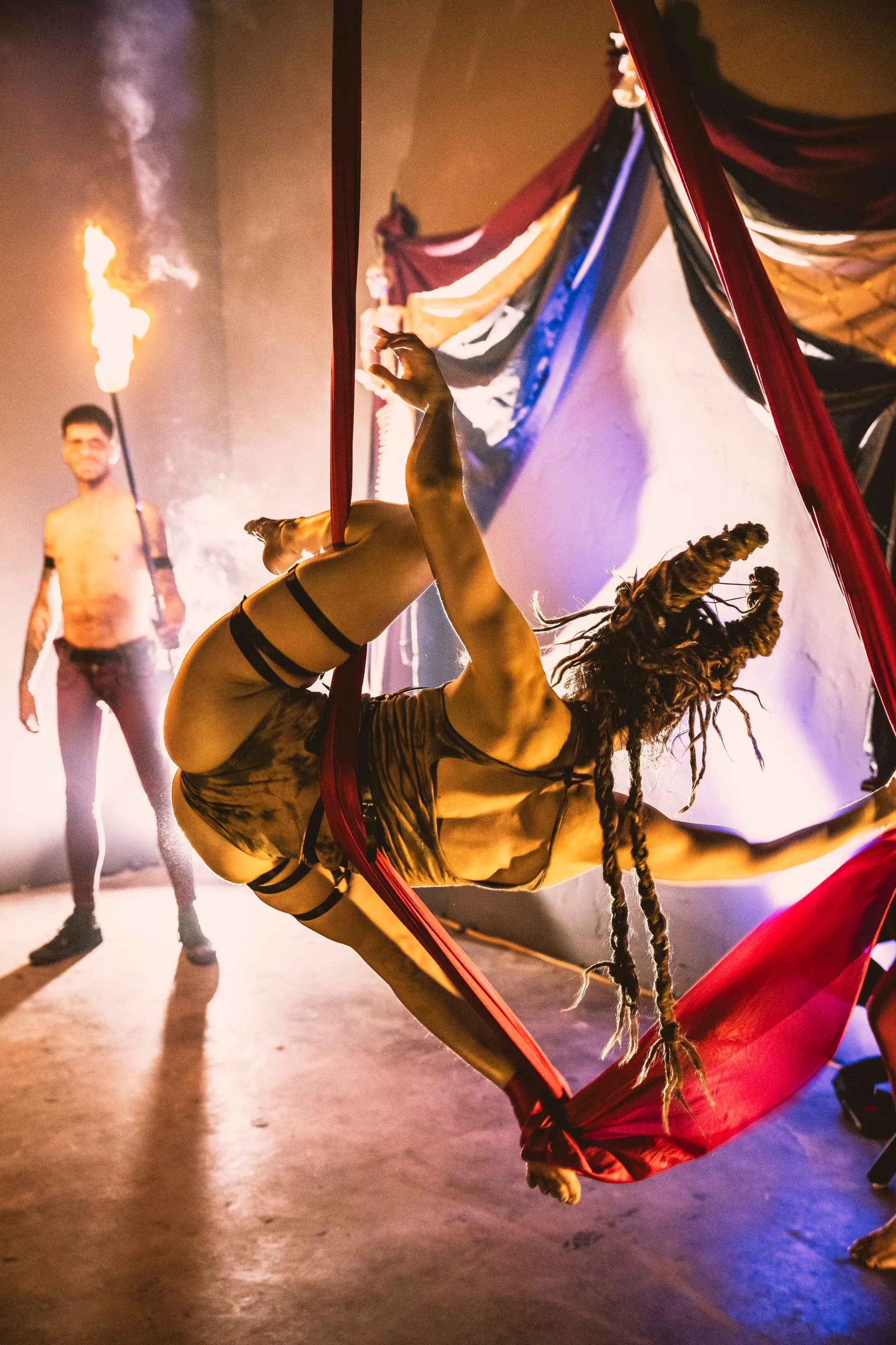 A woman performing on Aerial Hammock.
